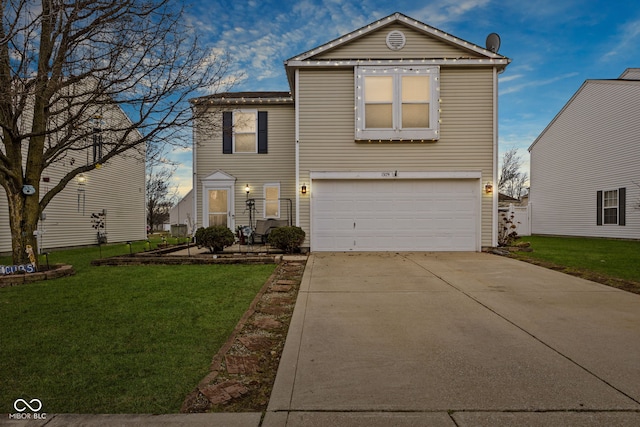 view of front of house featuring a garage and a front yard