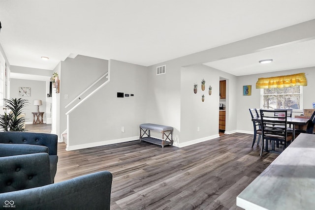 living room featuring dark hardwood / wood-style flooring