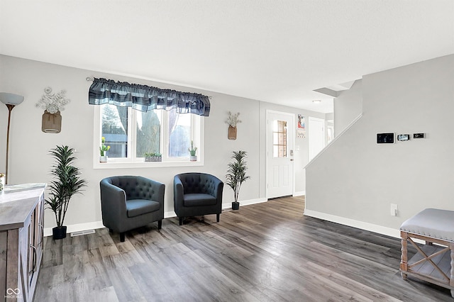 living area featuring hardwood / wood-style flooring