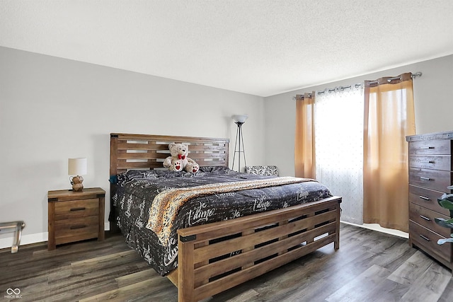 bedroom featuring dark hardwood / wood-style flooring