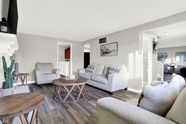 living room with wood-type flooring