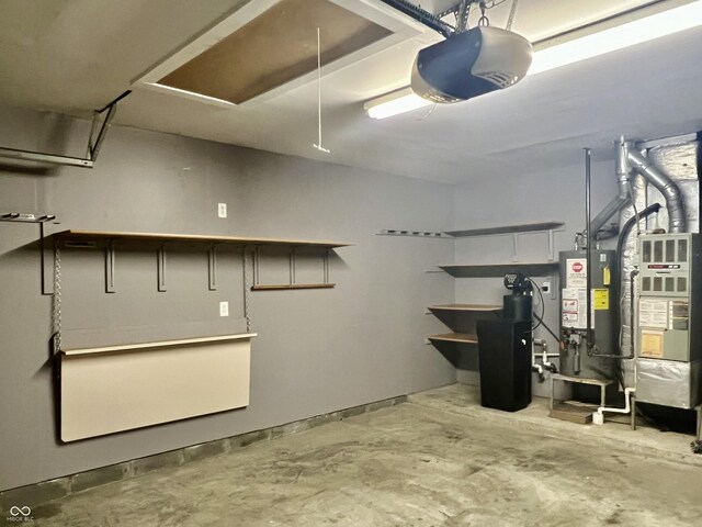 basement featuring heating unit and water heater