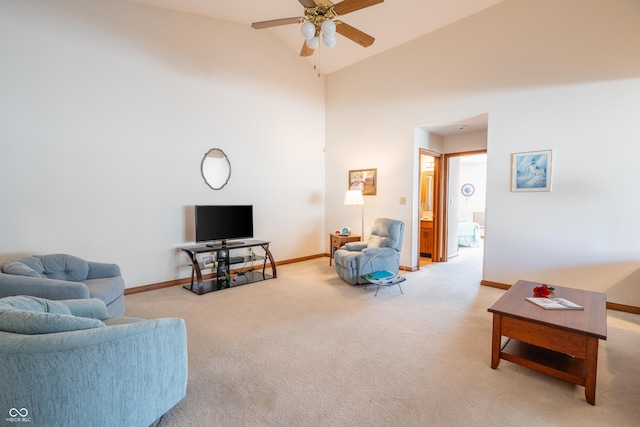 living room featuring ceiling fan, light colored carpet, and high vaulted ceiling