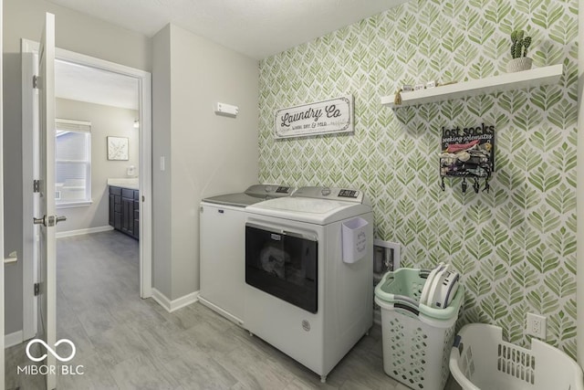 laundry area featuring washing machine and dryer