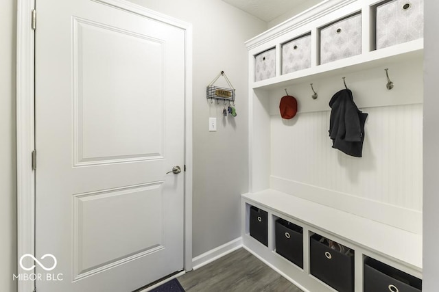 mudroom with dark wood-type flooring