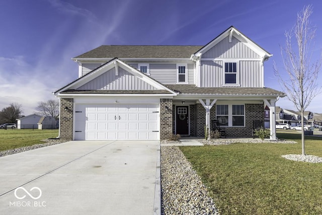 view of front facade featuring a front yard and a garage