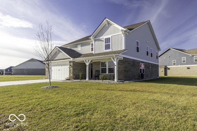 view of front property featuring a garage and a front yard