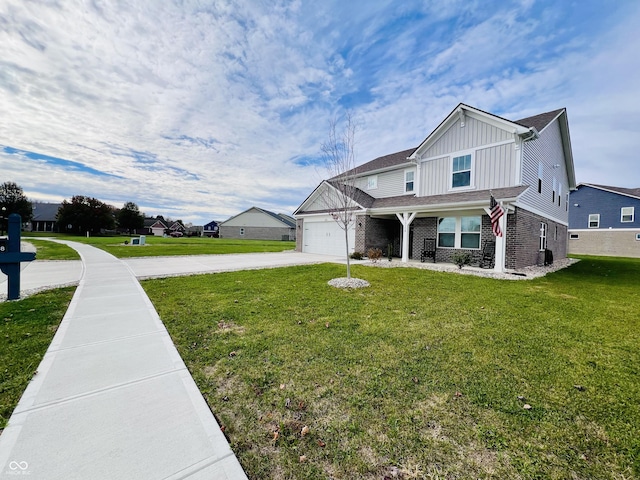 view of front of property with a garage and a front yard