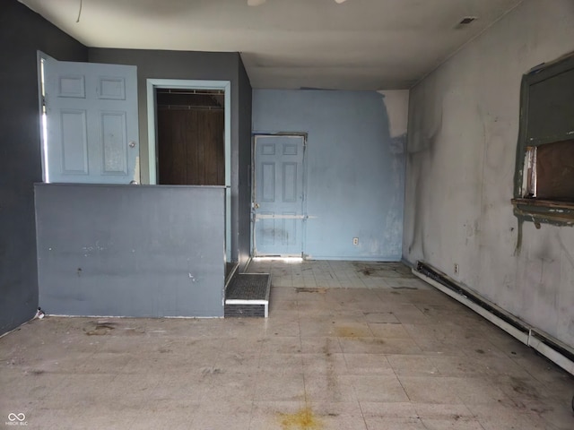 7071 S Charles Pl, Terre Haute, IN 47802 - spare room with baseboard heating