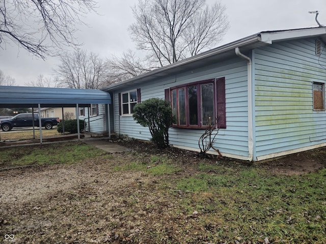 7071 S Charles Pl, Terre Haute, IN 47802 - view of home's exterior featuring a carport