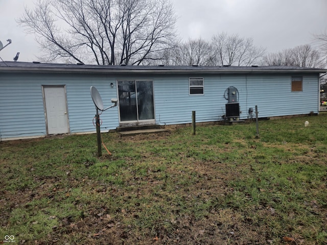 7071 S Charles Pl, Terre Haute, IN 47802 - back of house featuring a yard