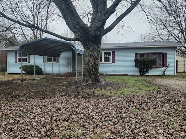 7071 S Charles Pl, Terre Haute, IN 47802 - view of front facade with a carport