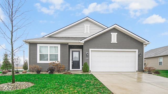 view of front facade with a front yard and a garage