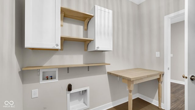 clothes washing area with washer hookup, dark hardwood / wood-style floors, hookup for an electric dryer, and cabinets