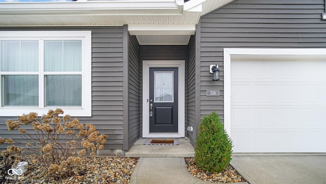 property entrance with a garage