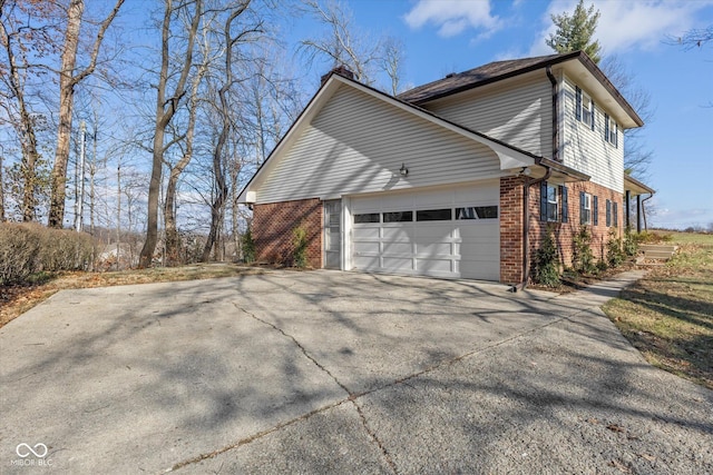 view of home's exterior with a garage