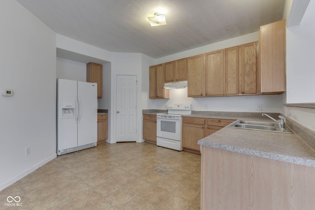 kitchen with a textured ceiling, white appliances, sink, and light brown cabinetry