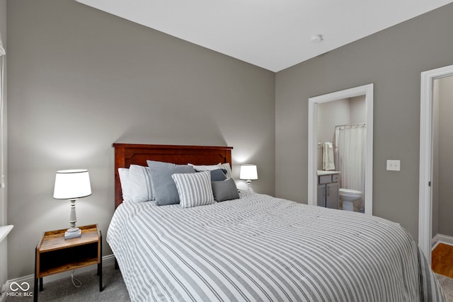 bedroom featuring carpet floors and ensuite bathroom