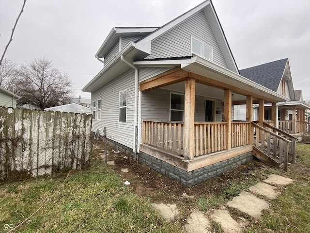 view of home's exterior with covered porch