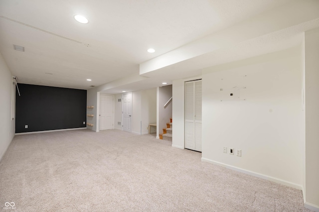 basement with light carpet