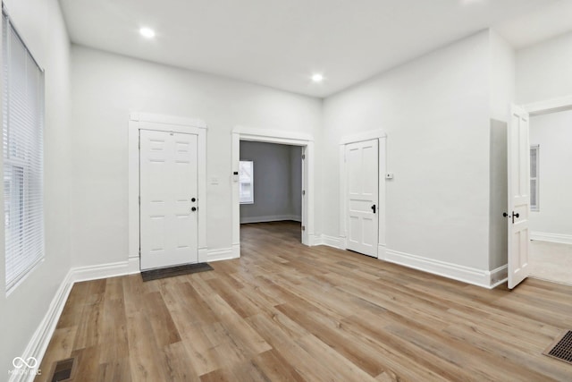 interior space with light hardwood / wood-style flooring