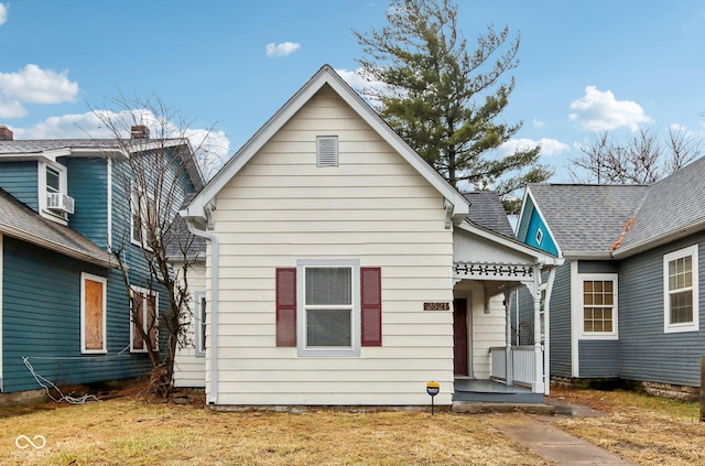 bungalow-style home featuring cooling unit