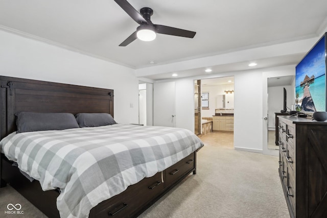 bedroom featuring light carpet, ensuite bathroom, ceiling fan, and ornamental molding