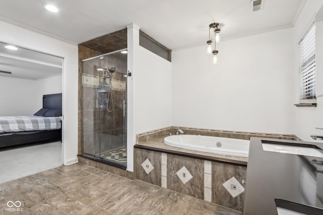 bathroom with crown molding and shower with separate bathtub