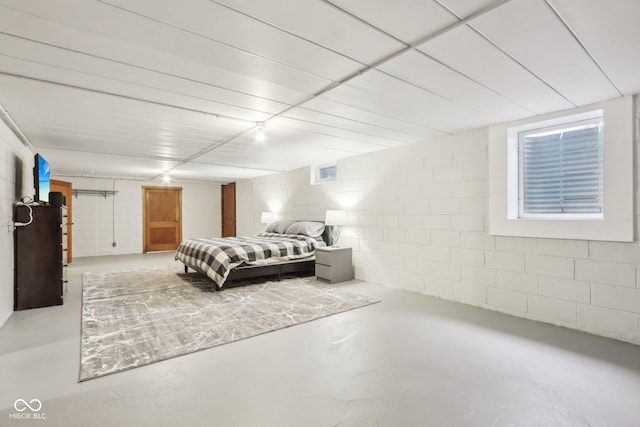 bedroom with concrete flooring