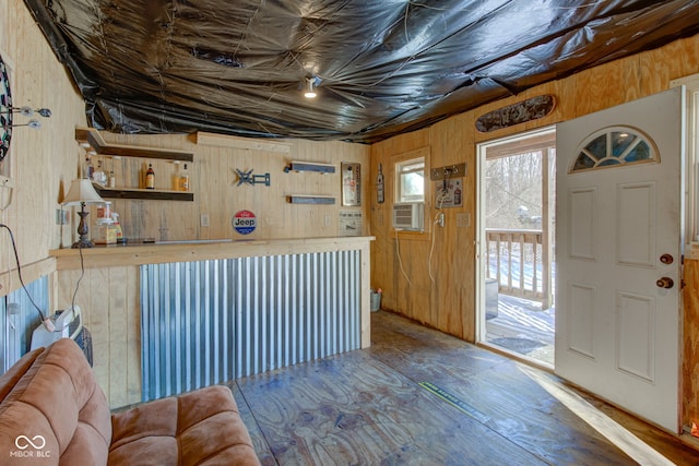 foyer entrance with cooling unit and wooden walls