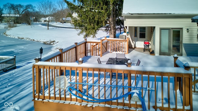 view of snow covered deck