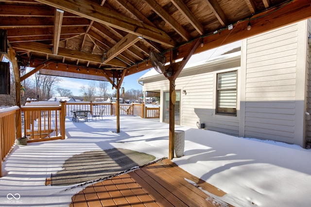 view of snow covered deck