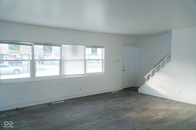 interior space with dark hardwood / wood-style flooring