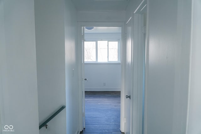 corridor with dark wood-type flooring