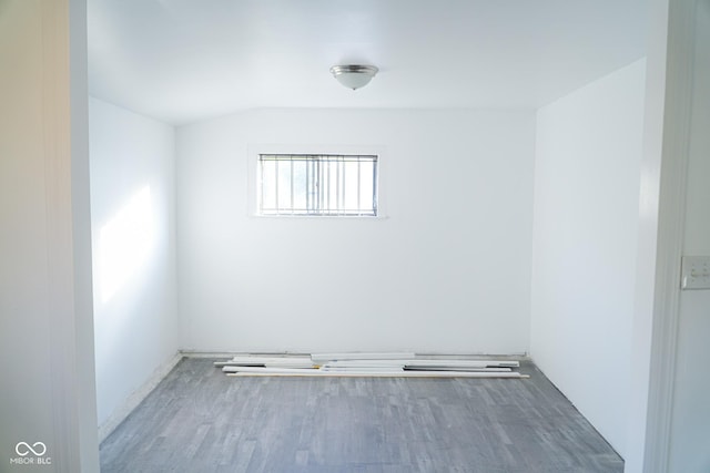 unfurnished room featuring wood-type flooring