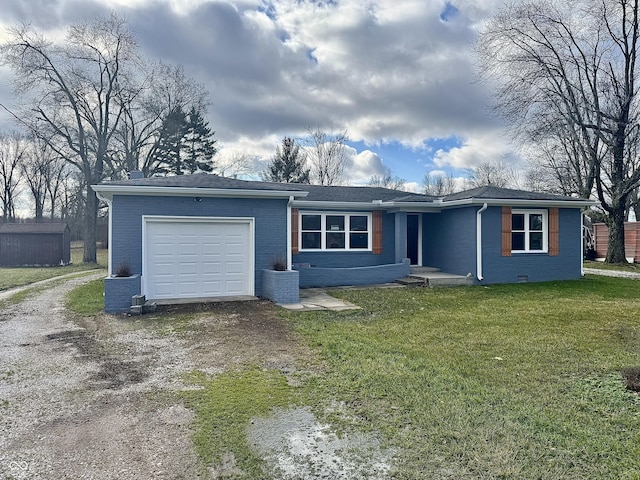 view of front facade with a garage and a front yard