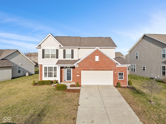 view of front property with a front lawn and a garage