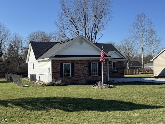 view of front of property with a front lawn