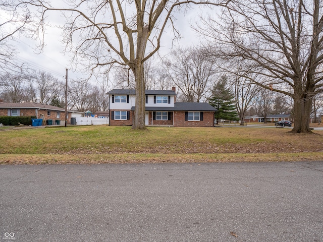 view of front of house featuring a front lawn