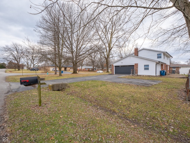 view of yard with a garage