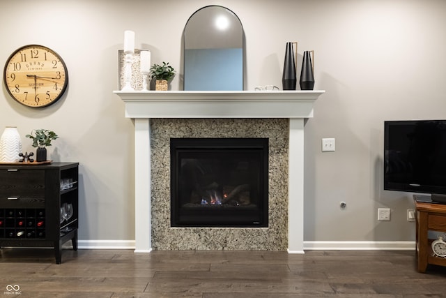 living room with dark hardwood / wood-style flooring