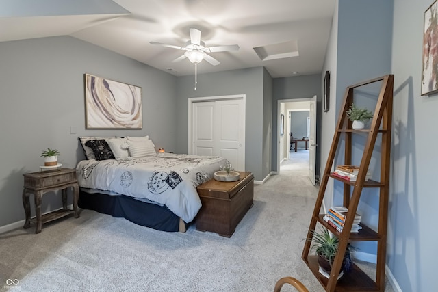 carpeted bedroom featuring a closet and ceiling fan