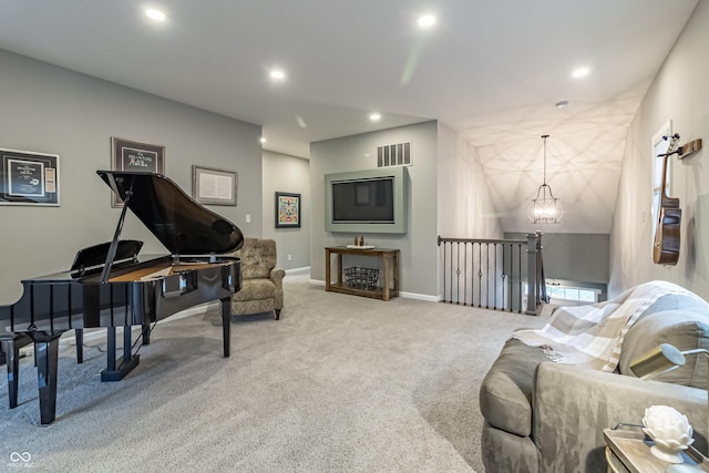 living room featuring carpet, vaulted ceiling, and a chandelier