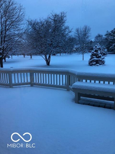 view of snow covered deck