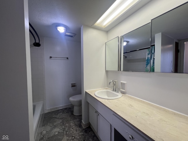 full bathroom with shower / tub combo, vanity, a textured ceiling, and toilet