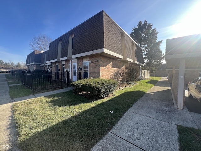 view of property exterior with a yard