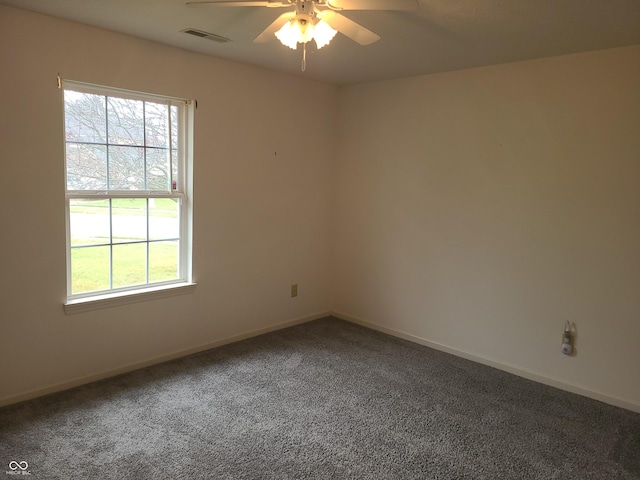 carpeted empty room with ceiling fan