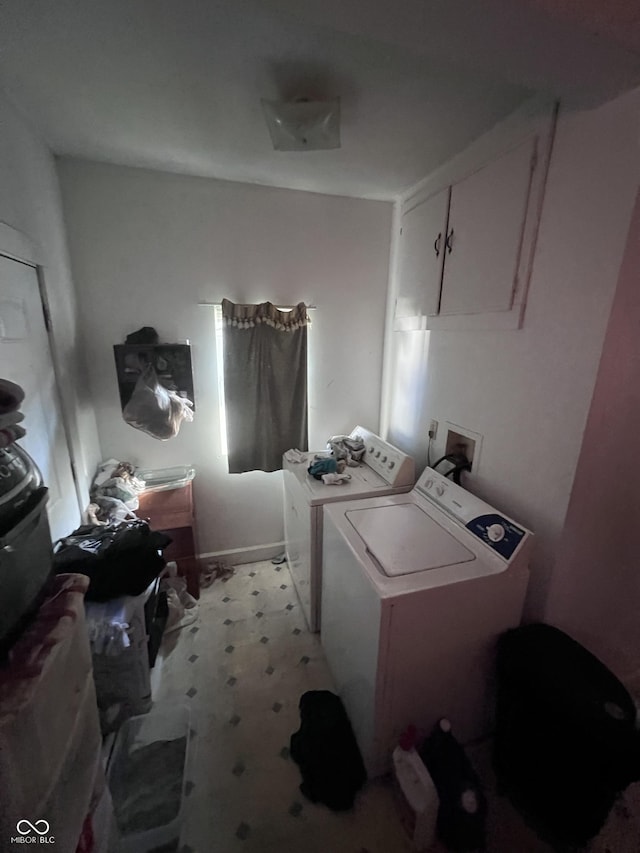 clothes washing area featuring independent washer and dryer