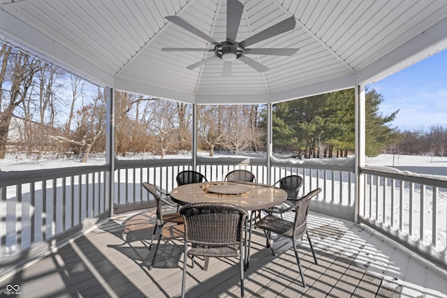 snow covered deck with ceiling fan