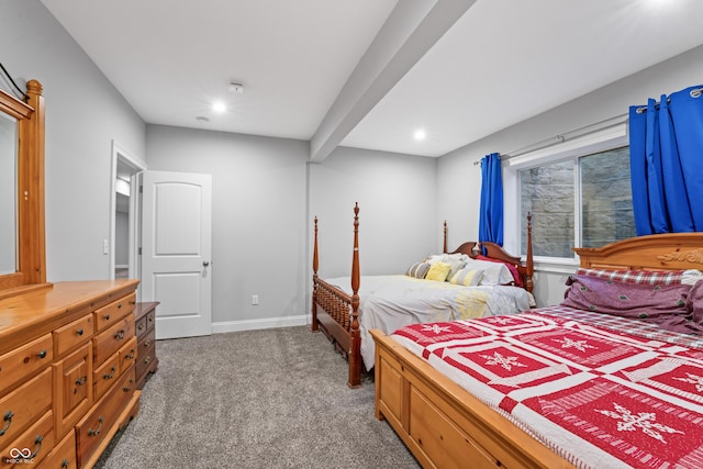 bedroom featuring light colored carpet